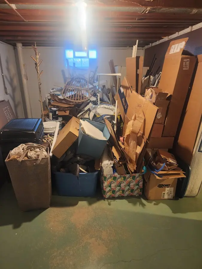 Roll-off dumpster container at job site for 8 Yard Dumpster Rental in Fairview